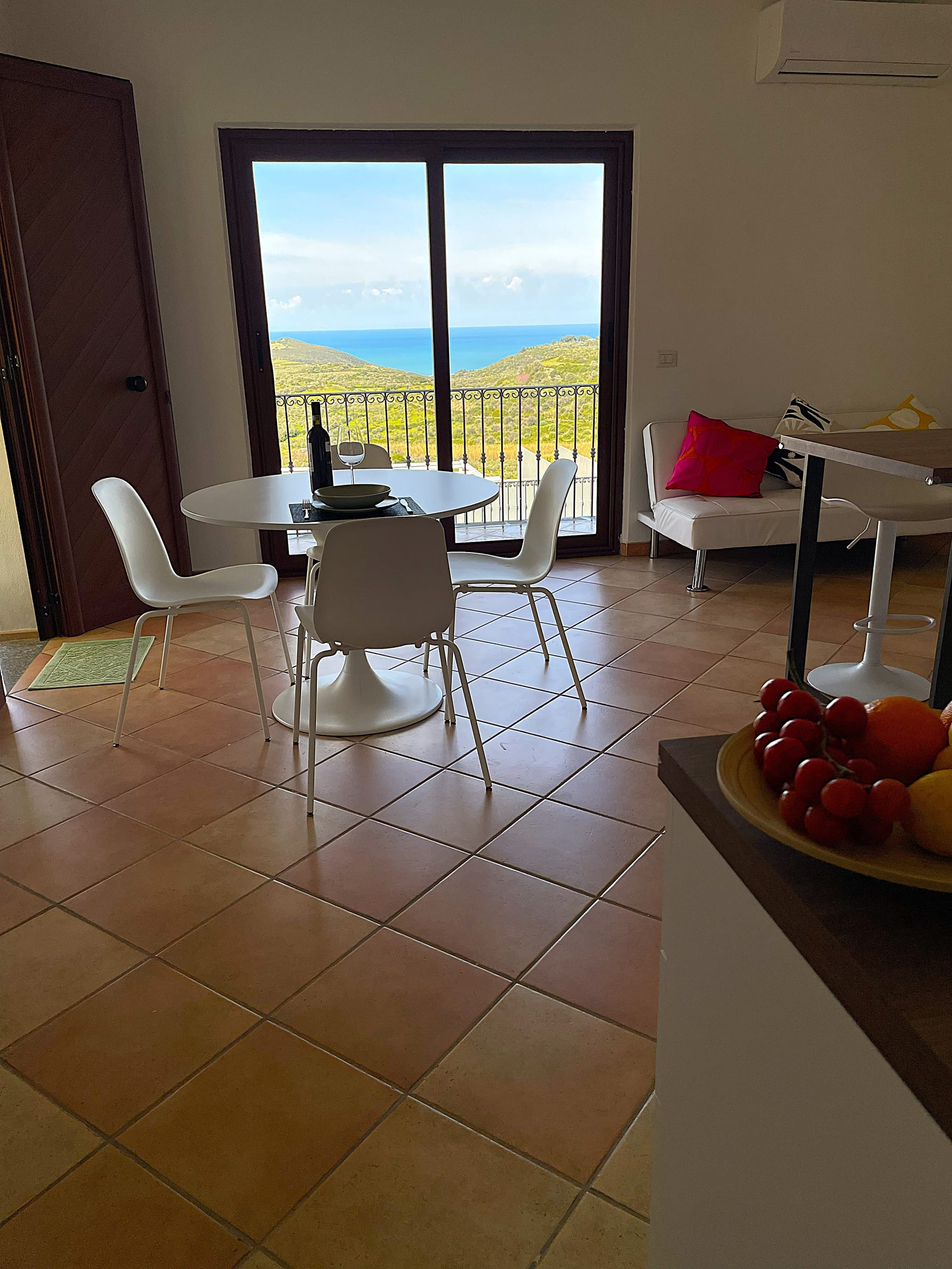 Dining area at Villa Laura with open sea view.