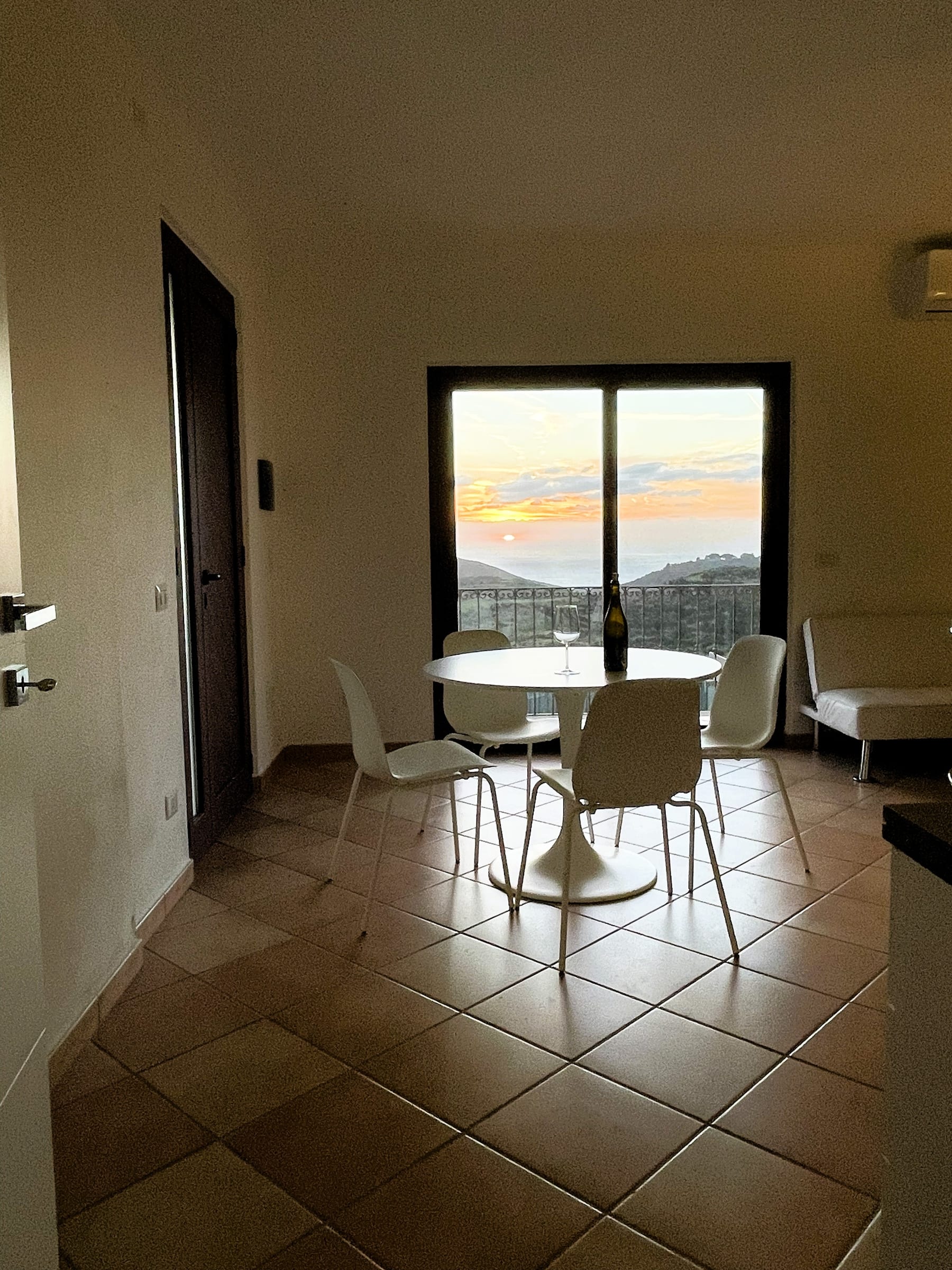 Rainbow over the green hills and sea near Villa Laura.